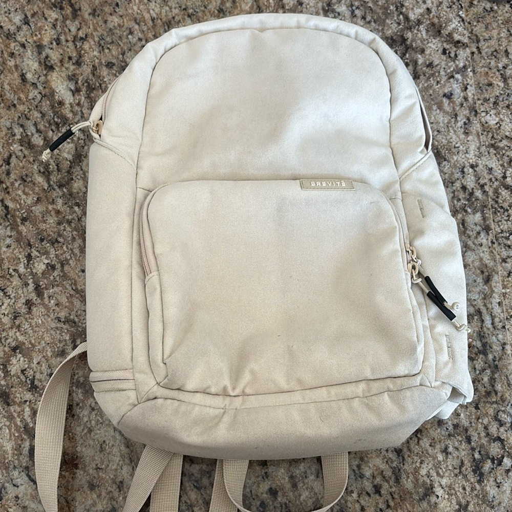 Selling water resistant Brevite backpack in bone/beige